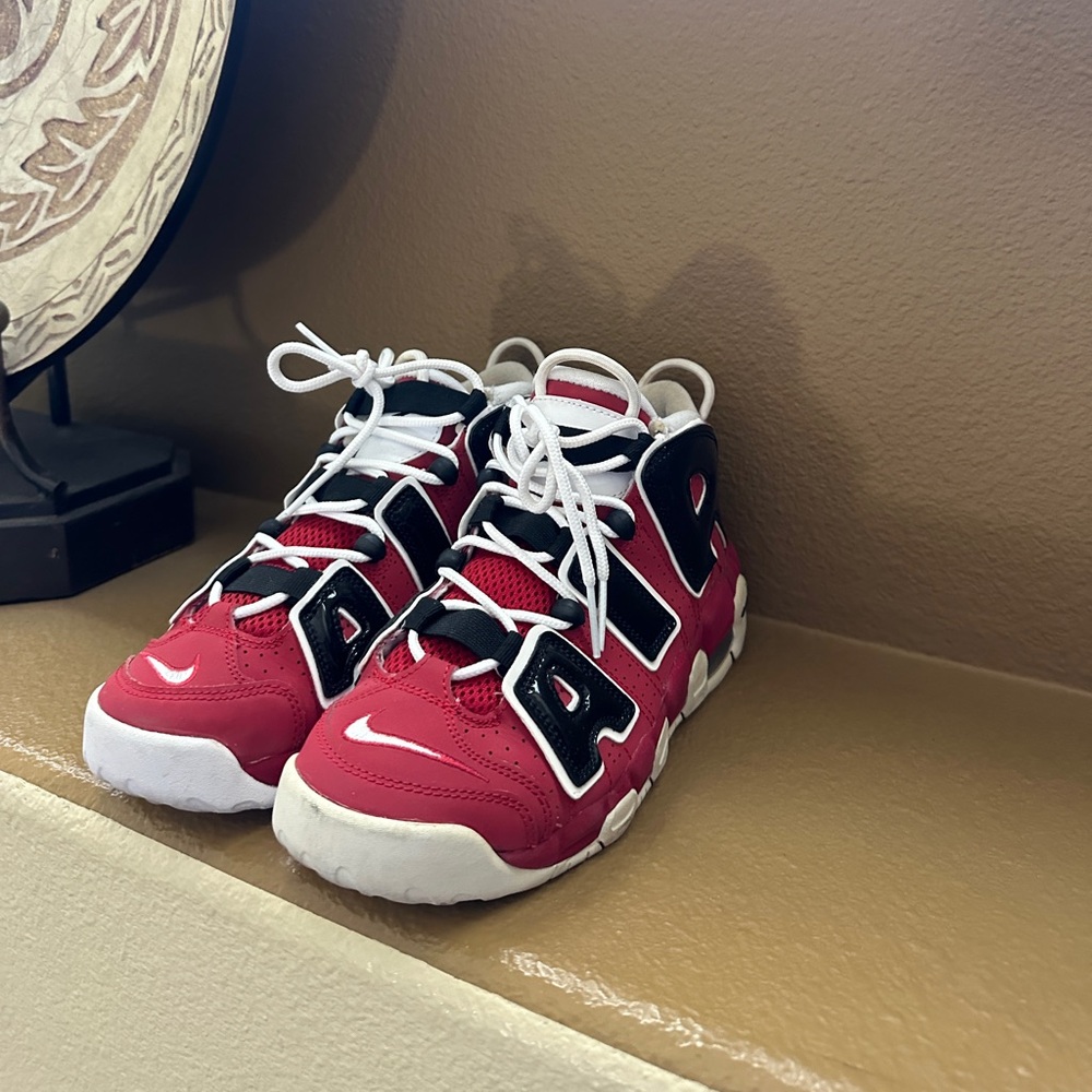 Nike air Uptempos in black and red